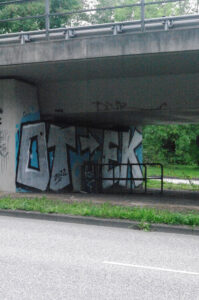 Graffiti am Barkauer Kreuz in Kiel: OTEK, 2022