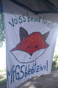 Vossbrook für alle. Transparent für eine zivile Entwicklung des MFG5-Geländes.
